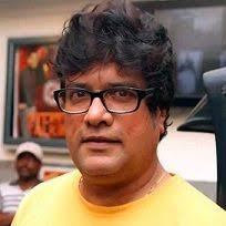 Rajesh Sharma (Meera's uncle)